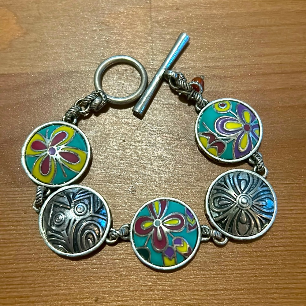 Lucky Brand silver tone and enamel five station toggle bracelet.